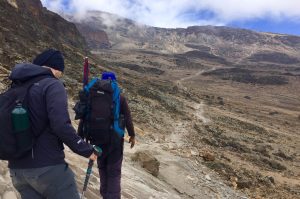 Hiking through stone dessert at Kilimanjaro