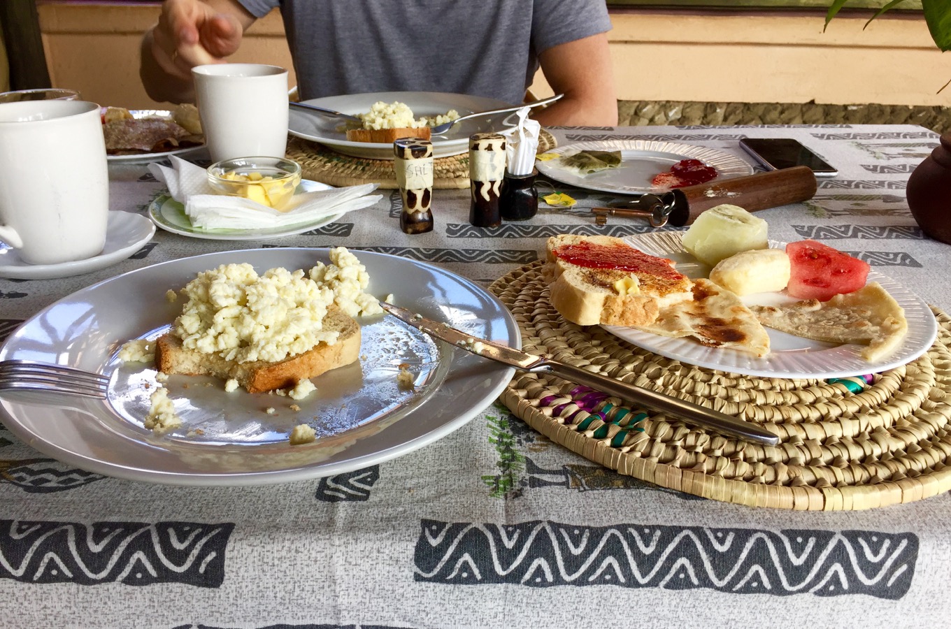 Scrambled egg fruit breakfast at Ambureni Coffee Lodge