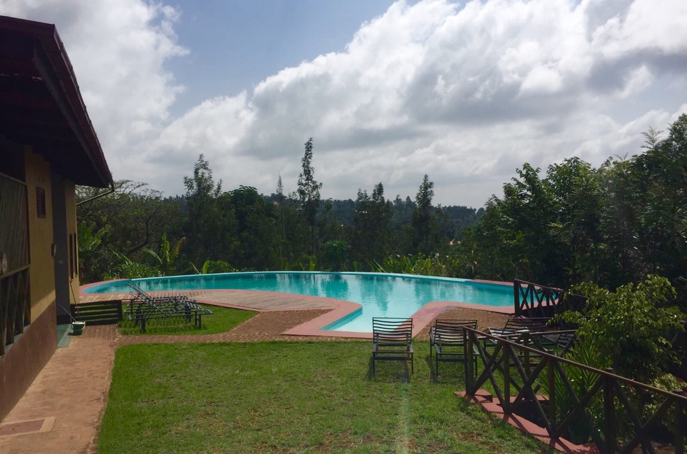 Pool and garden Ambureni Coffee Lodge