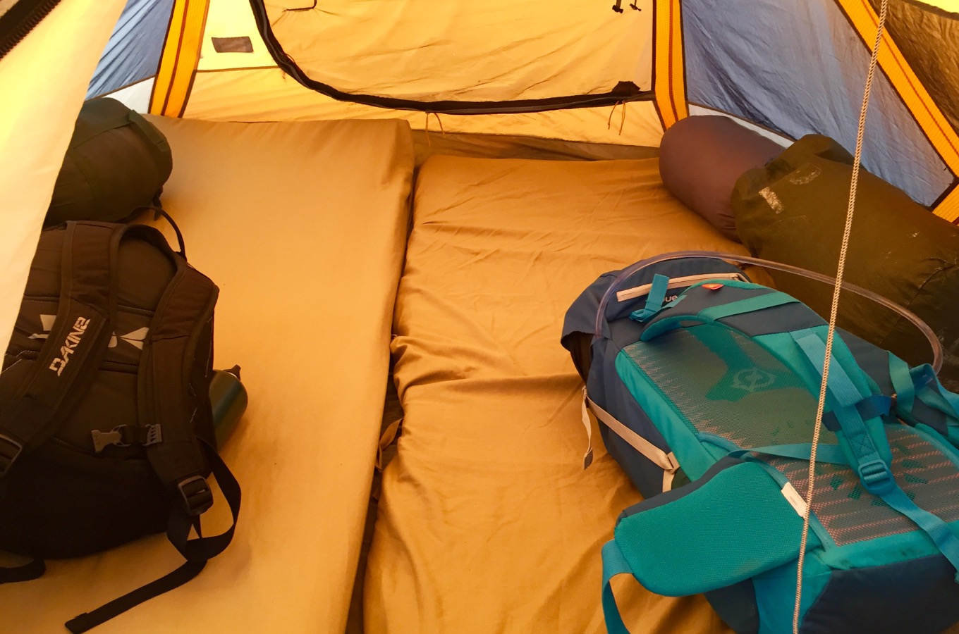 Tent with matrasses and backpacks