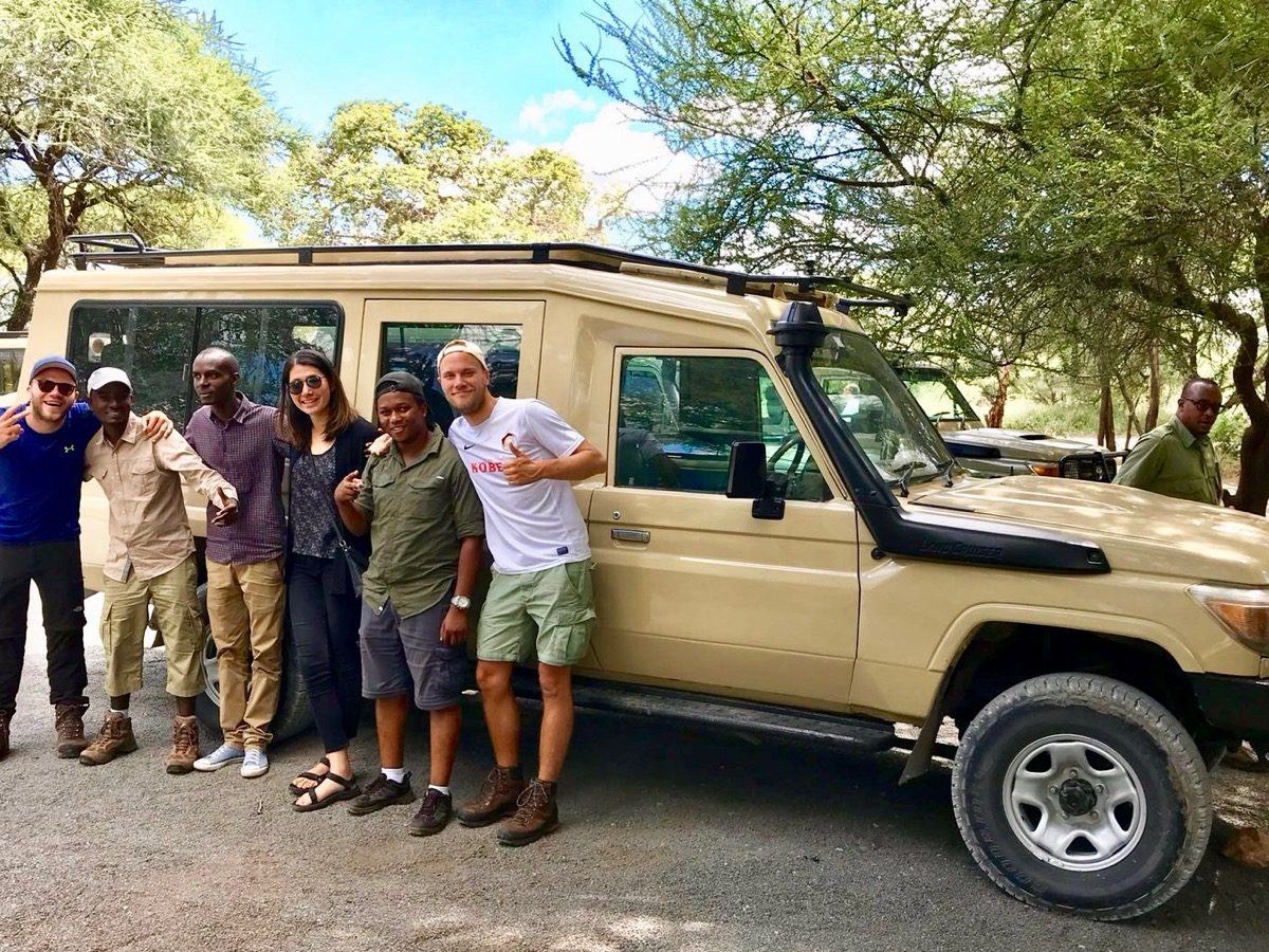Group photo after a successful safari in Tanzania